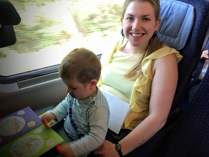 Tea in a train with baby Karlo on her lap
