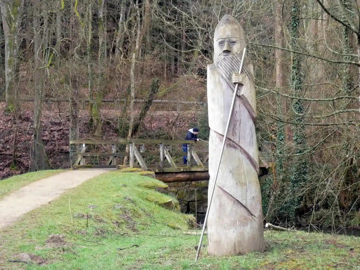 Wooden statue in forest in Luxembourg
