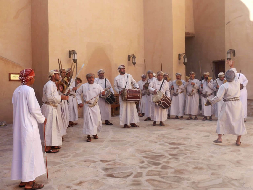 Traditional signing and dancing within Nizwa fort in Oman