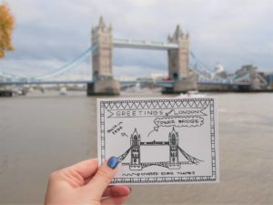 Colouring postcards Greetings from London with London bridge behind