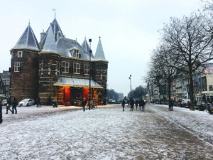 Snow on Waag during the Christmas time in Amsterdam, the Netherlands