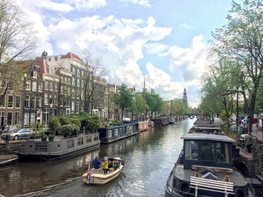 Small open boat on Amsterdam canals
