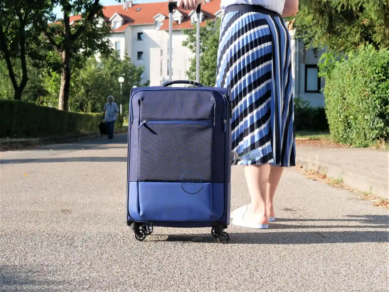 Blue rolling luggage
