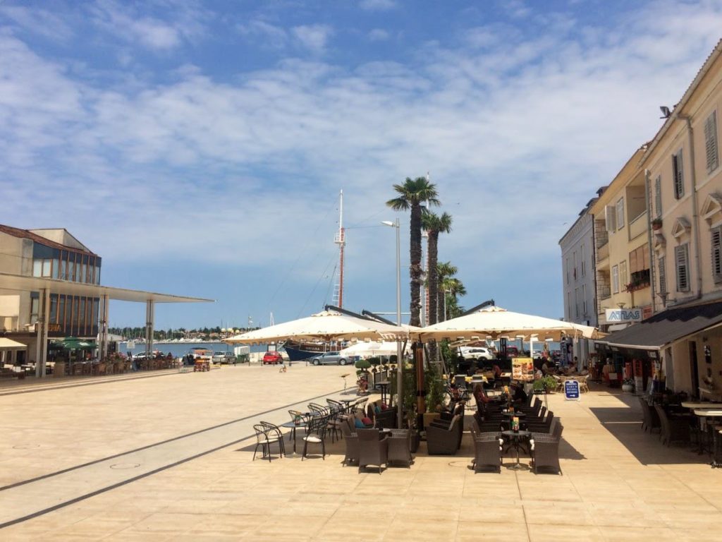 Square with cafes in Umag Istria