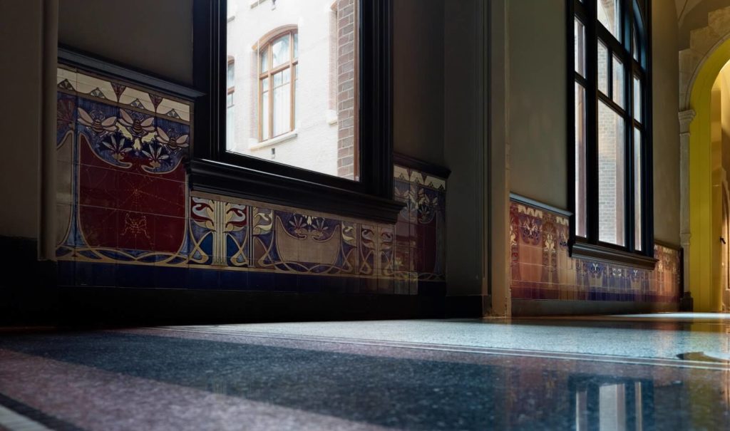conservatorium hotel corridor art nouveau tiles