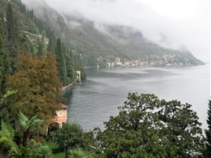 View on Como Lake with clouds below the mountains