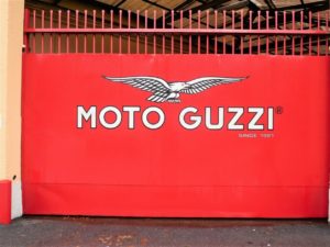 Red entrance doors to Moto Guzzi factory