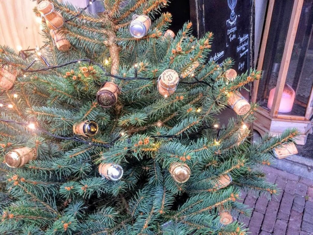Christmas tree decorated with wine bottle lids