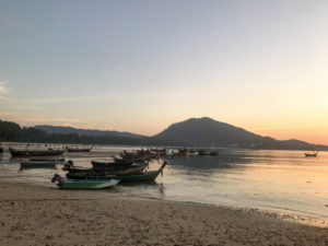 Boats at the Nai Yang beach on Phuket island in Thailand