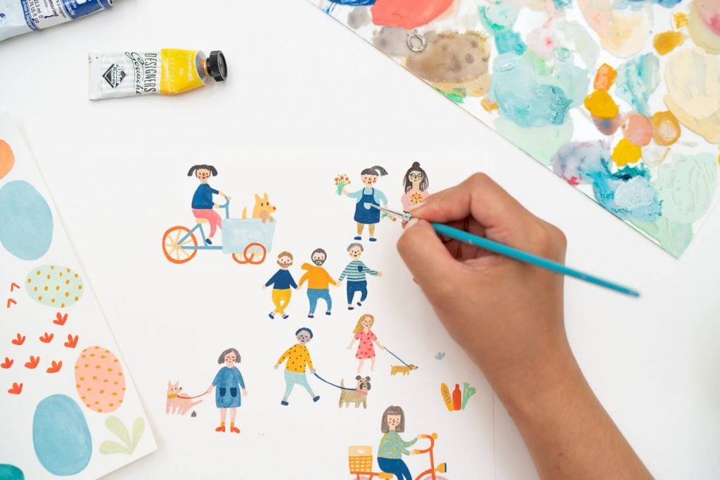 Alina Tang working on the Amsterdam illustration