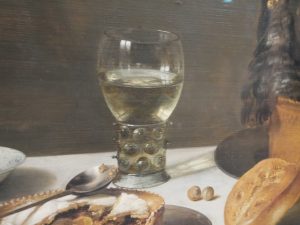 Reflections of light on a glass at the still life painting in the Rijksmuseum