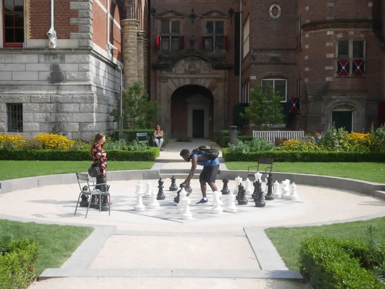 People playing chess in the courtyard of the Rijksmuseum in Amsterdam