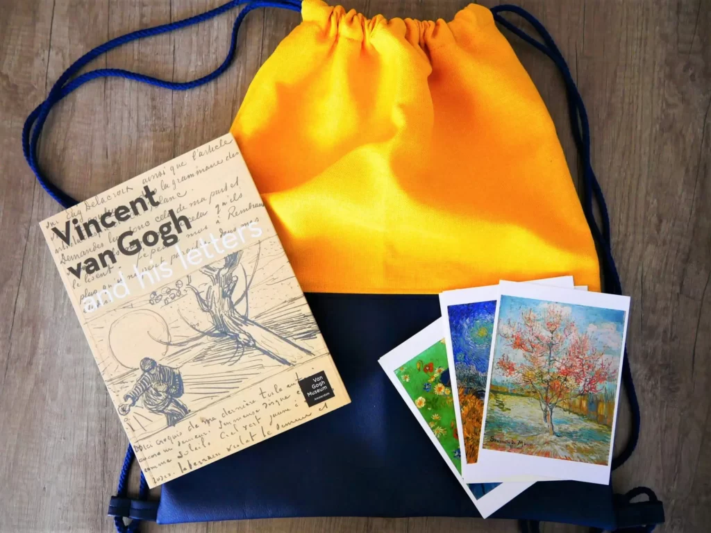 Backpack, book about Van Gogh and the photographs