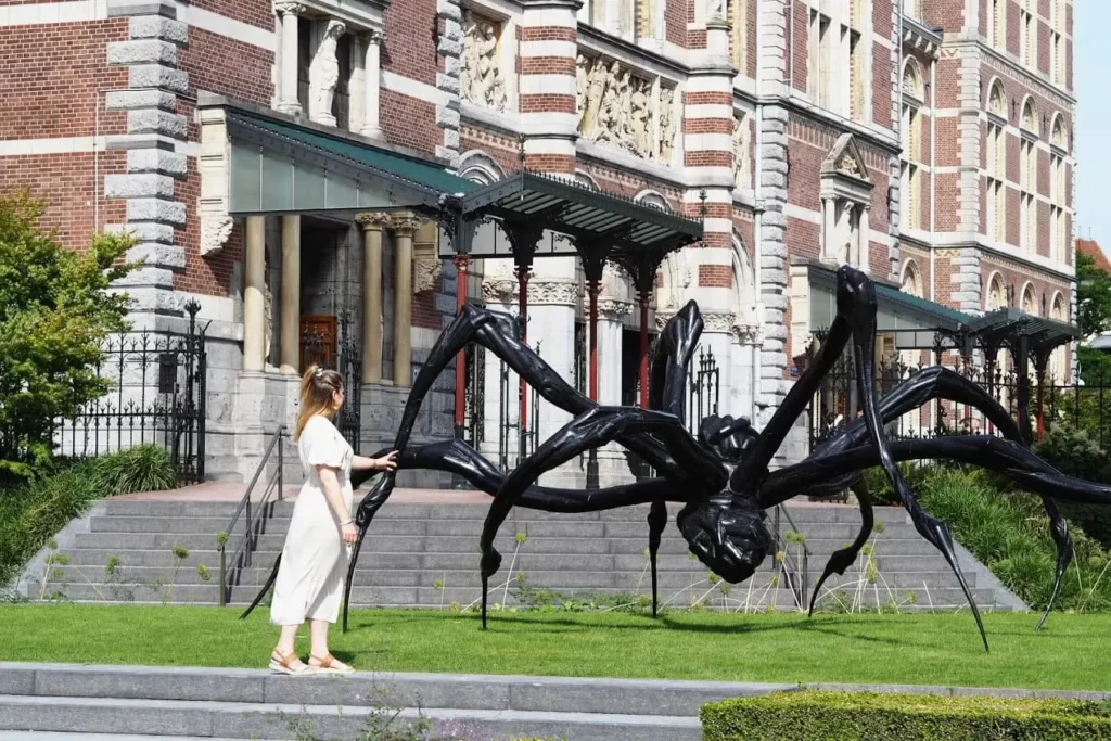 Tea with a giant spider statue in front the Rijksmuseum in Amsterdam