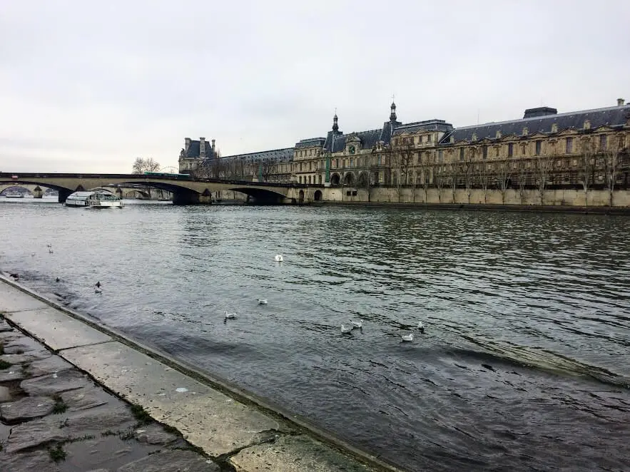 View on Louvre Museum from Seine river