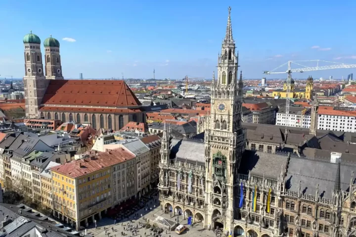 View on Mariaplatz with the new town hall and munich cathedral