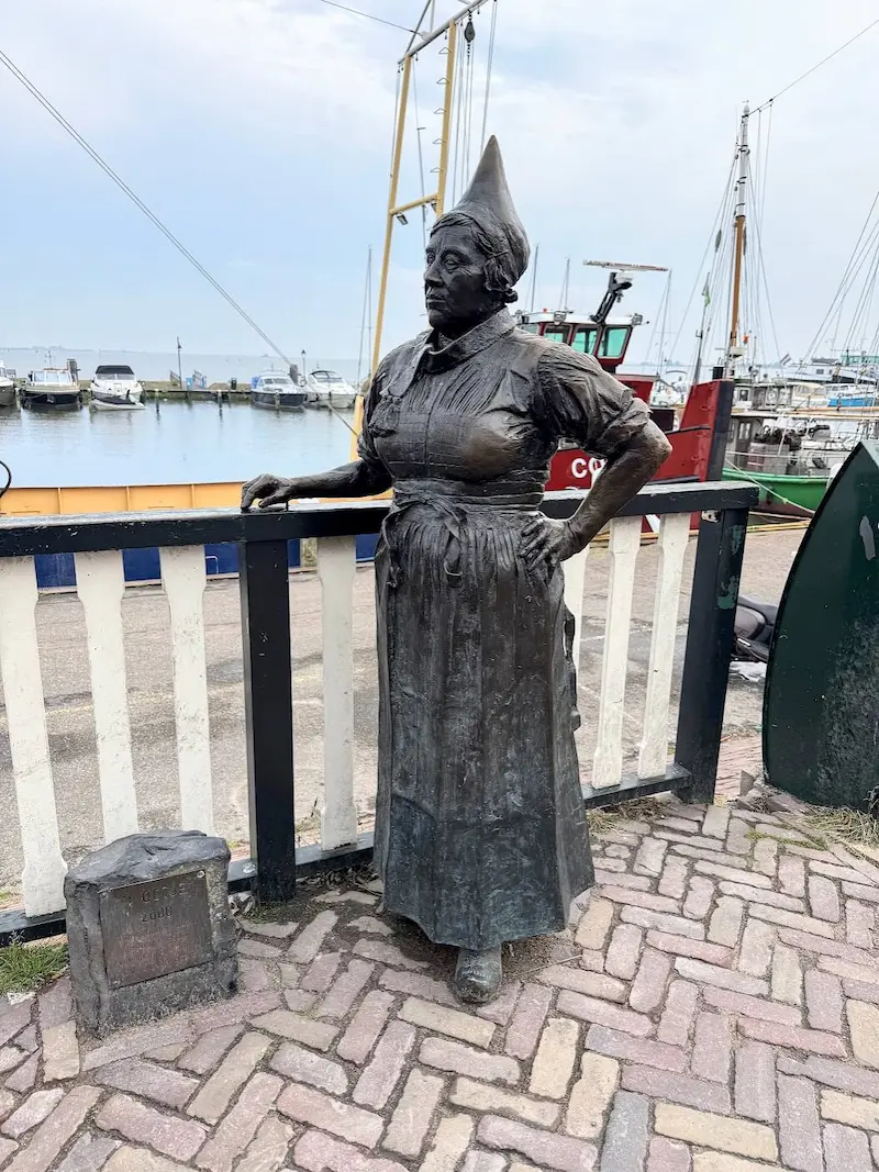 Statue of a woman in Volendam
